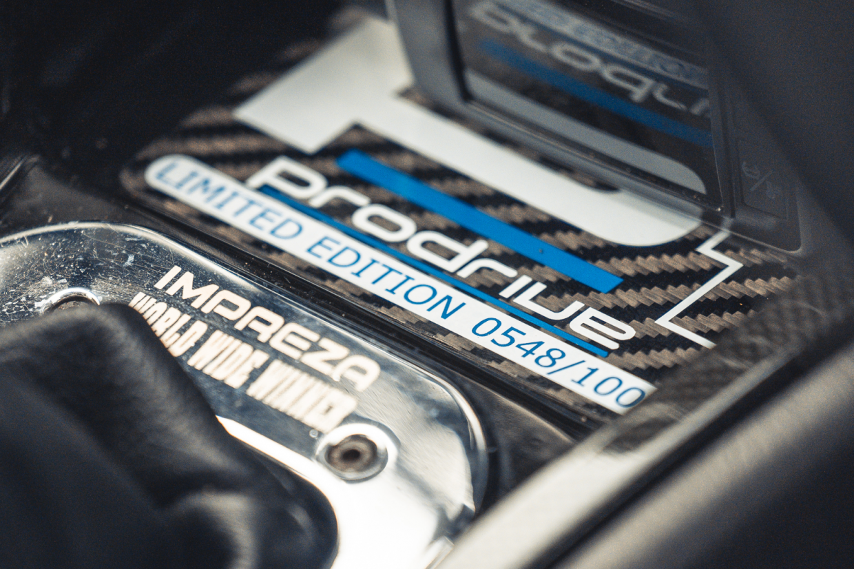 Classic & Sports Car - Black & Blue: Ford Escort RS Cosworth vs Subaru Impreza P1